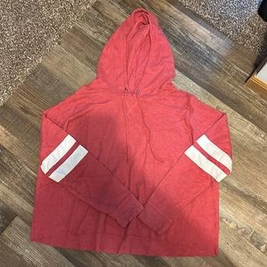 This is a pink cropped thin hoodie. Brand: So Size: Medium